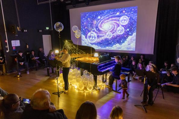Photo de concert d'élèves avec flûtiste et pianistes